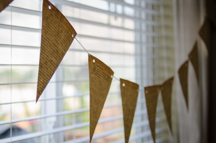 Love this super cute baby shower idea! I love the vintage books as bunting!