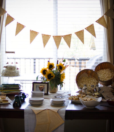 Love this super cute baby shower idea! I love the book pages as a table runner