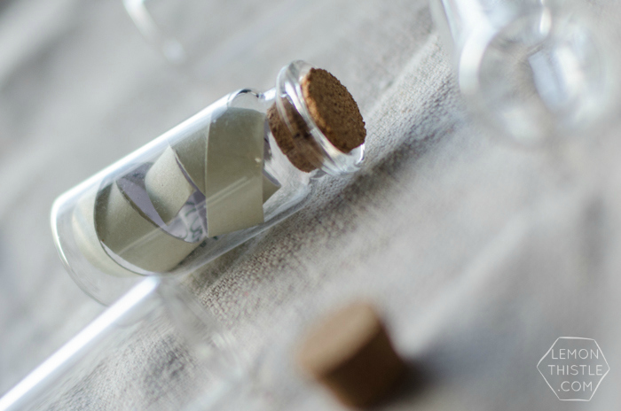 So much fun! Tiny Message in a Bottle- this would make a great nautical party invite