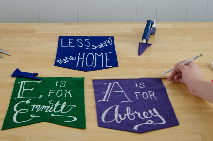DIY Hand Painted Wall Hangings from Felt- these are super cute for a nursery!