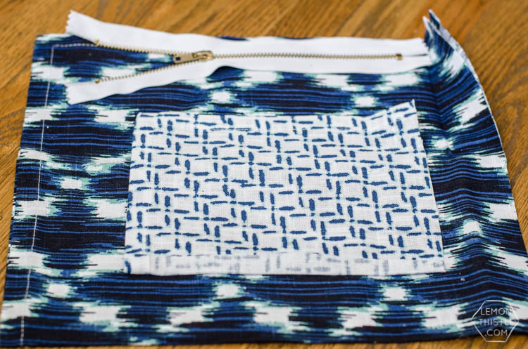 DIY Exposed Zipper Pouch (made out of a tea towel!) I love the combination.