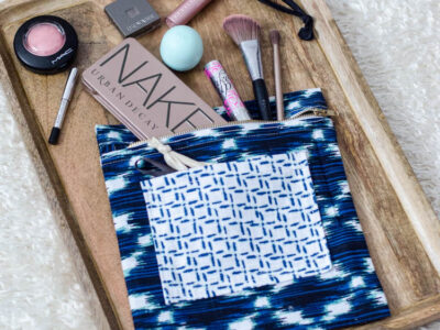 DIY Exposed Zipper Pouch (made out of a tea towel!) I love the combination.