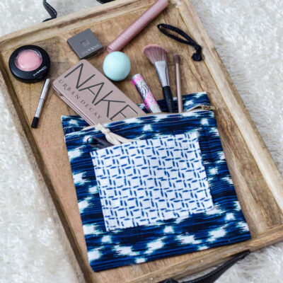 DIY Exposed Zipper Pouch (made out of a tea towel!) I love the combination.