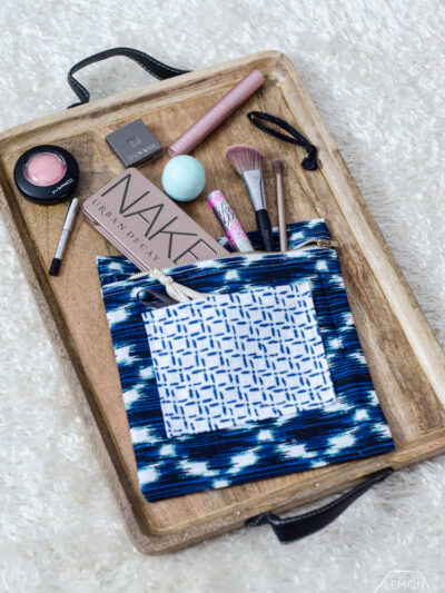 DIY Exposed Zipper Pouch (made out of a tea towel!) I love the combination.