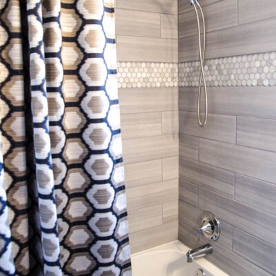 DIY Extra Long Custom Design Shower Curtain- I love how high end this looks!