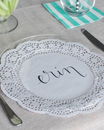 DIY Handlettered Doily Place Settings- such a gorgeous (and affordable!) tablescape