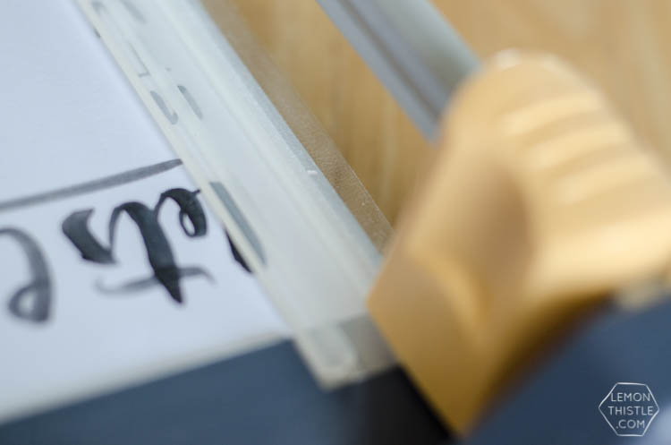 Turn any art into a dry erase meal planner! I love the hand lettering on this one