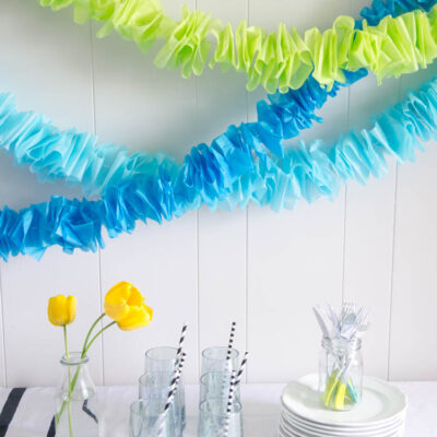 DIY Ruffled Tissue Paper Garland- so simple and costs pennies!