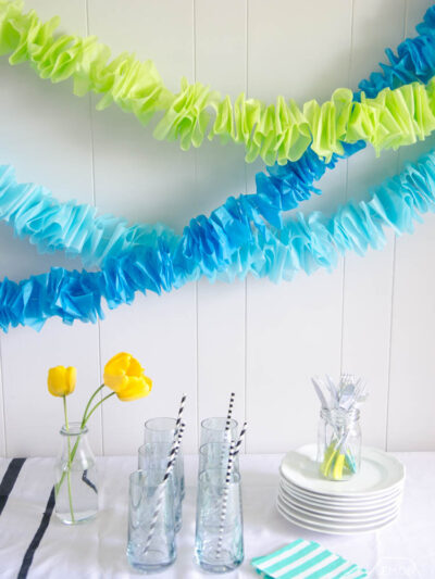 DIY Ruffled Tissue Paper Garland- so simple and costs pennies!