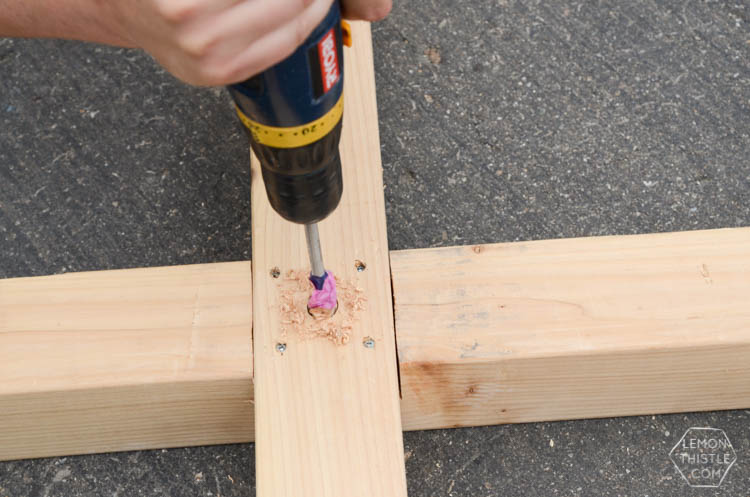 DIY X Leg Patio Table with Pipe Trestle