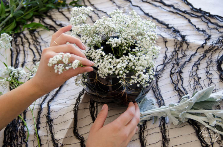 DIY Spooky Floral Halloween Centrpiece that's actually classy! Black and White Halloween Party