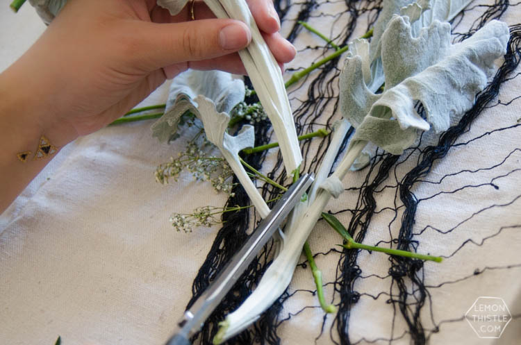 DIY Spooky Floral Halloween Centrpiece that's actually classy! Black and White Halloween Party