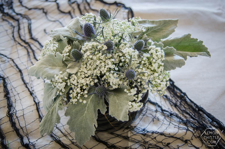 DIY Spooky Floral Halloween Centrpiece that's actually classy! Black and White Halloween Party