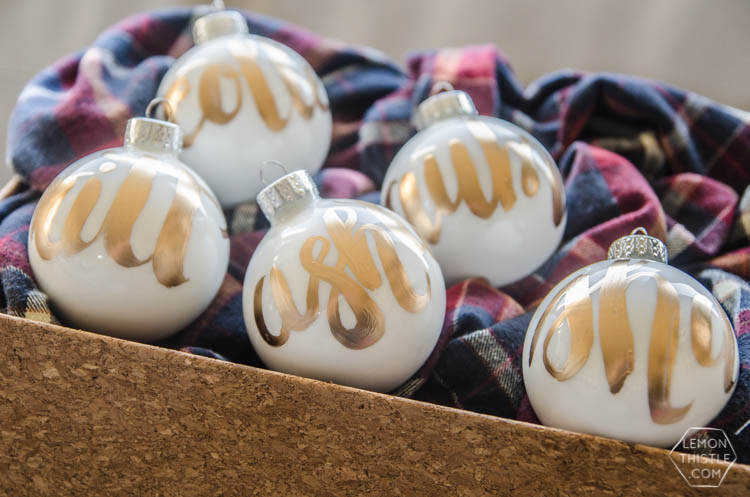 DIY Hand Lettered Ornaments- these would make great gifts for Christmas with the person's name!