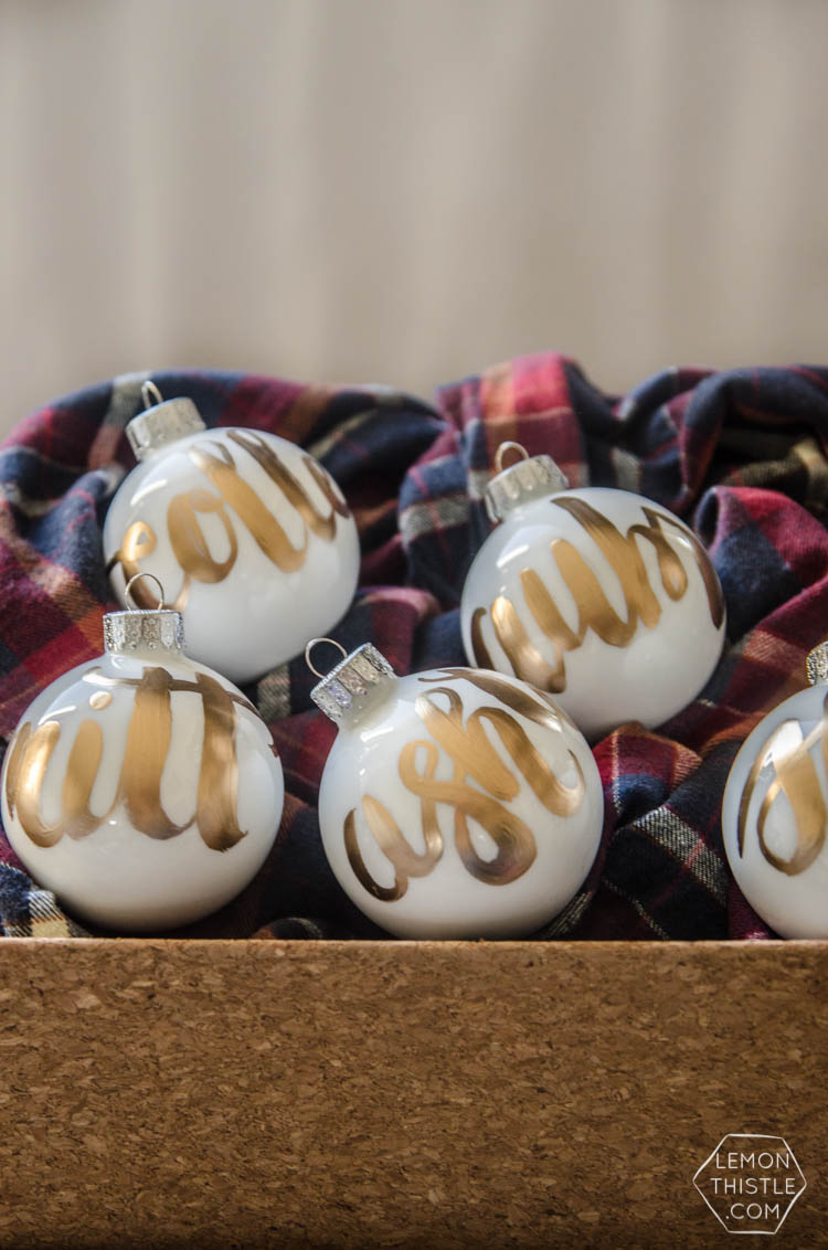 DIY Hand Lettered Ornaments- these would make great gifts for Christmas with the person's name!