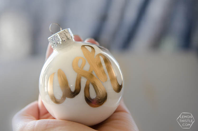 DIY Hand Lettered Ornaments- these would make great gifts for Christmas with the person's name!