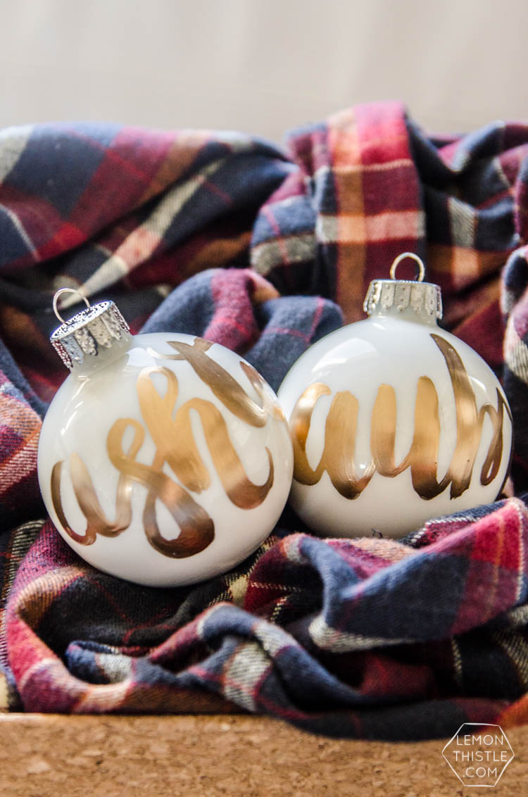 DIY Hand Lettered Ornaments- these would make great gifts for Christmas with the person's name!