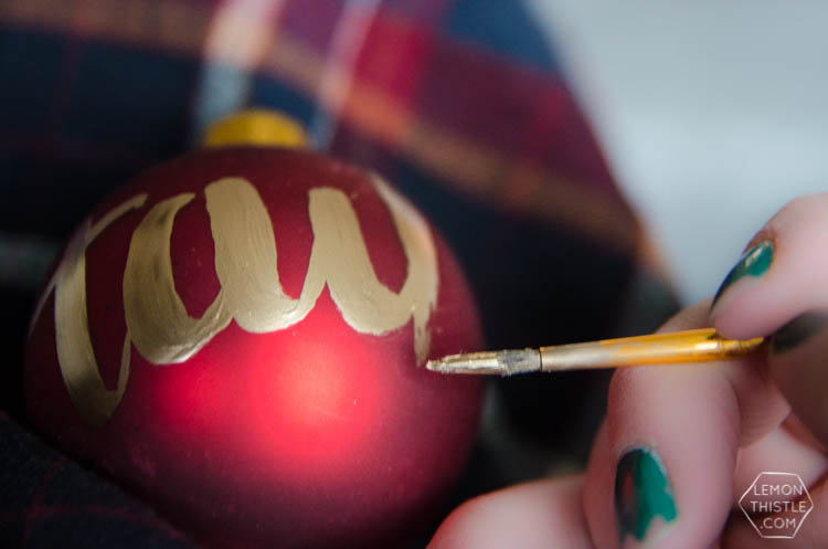 DIY Hand Lettered Ornaments- these would make great gifts for Christmas with the person's name!
