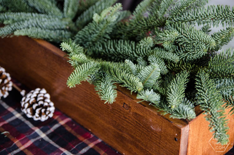 DIY Rustic Holiday Centrepiece- I love that the long box could be used for arrangements year round!