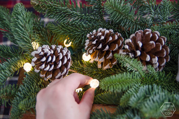 DIY Rustic Holiday Centrepiece- I love that the long box could be used for arrangements year round!