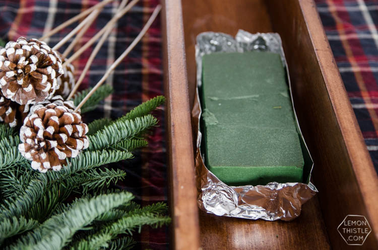DIY Rustic Holiday Centrepiece- I love that the long box could be used for arrangements year round!