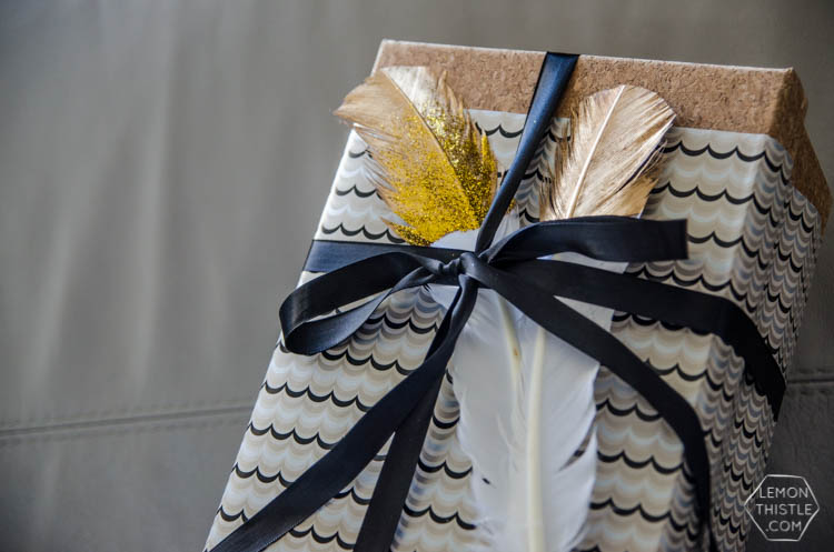 DIY gilded and glittered feather gift toppers... these would make cute christmas ornaments too!
