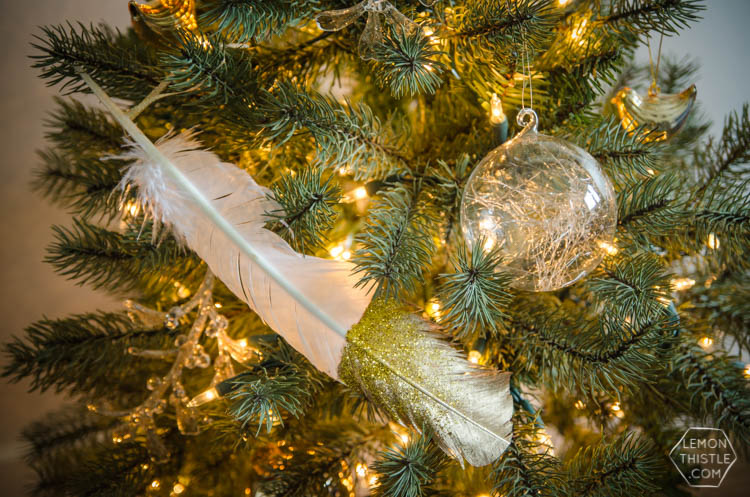 DIY gilded and glittered feather gift toppers... these would make cute christmas ornaments too!