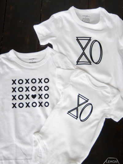 3 DIY XO Tshirts and Onesie made with black iron on vinyl