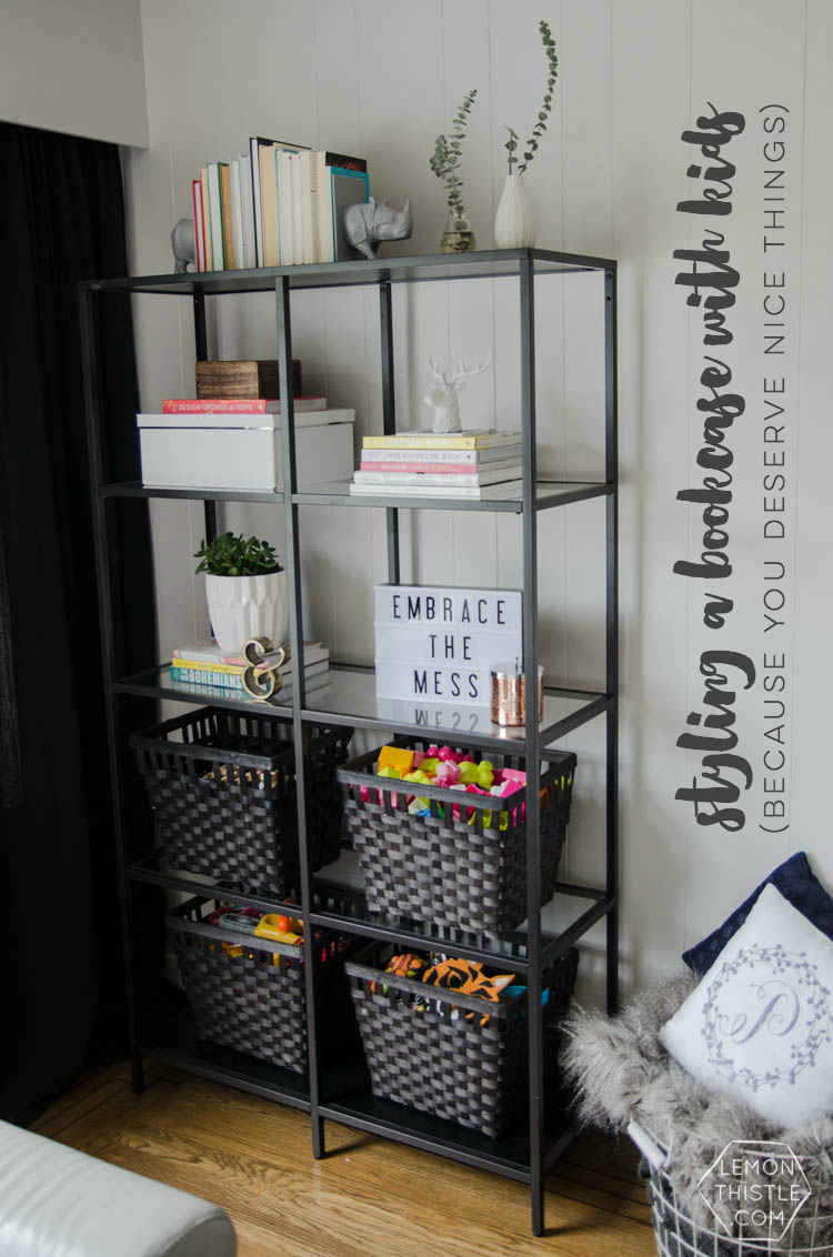 Styling a bookcase with kids. YES! Just because you have kids doesn't mean you can't have nice things.