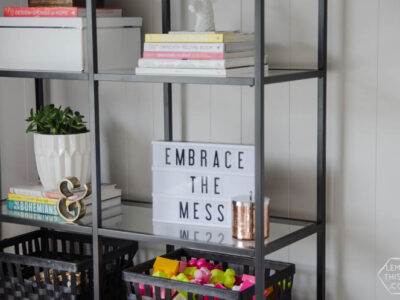 Styling a bookcase with kids. YES! Just because you have kids doesn't mean you can't have nice things.