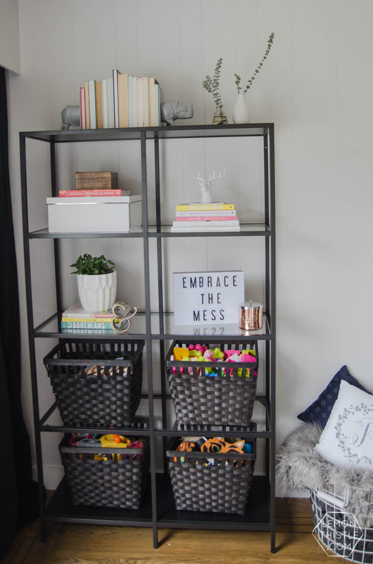 Styling a bookcase with kids. YES! Just because you have kids doesn't mean you can't have nice things.