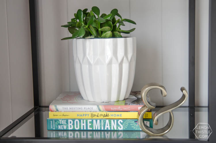 Styling a bookcase with kids. YES! Just because you have kids doesn't mean you can't have nice things.