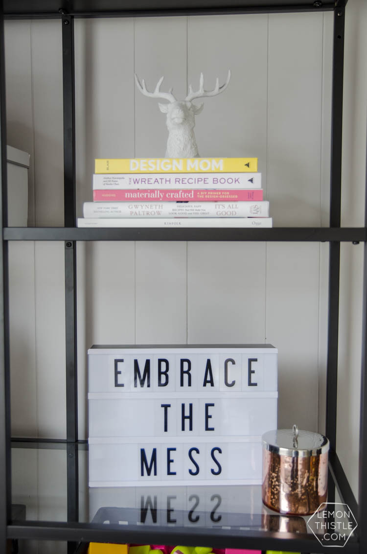 Styling a bookcase with kids. YES! Just because you have kids doesn't mean you can't have nice things.