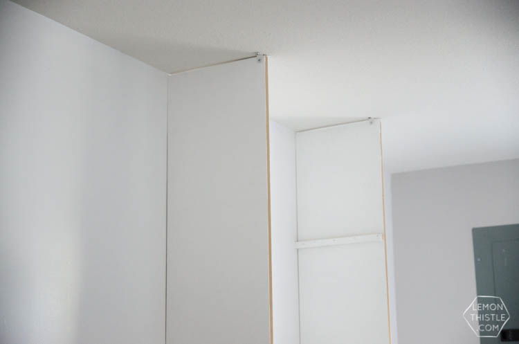 DIY custom built in shelving unit- click through for full tutorial