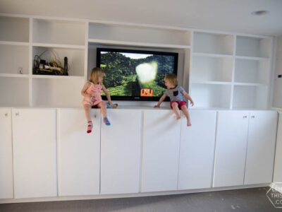 DIY built in cabinets for TV and storage- click through for full tutorial