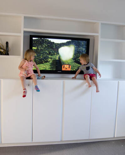 DIY built in cabinets for TV and storage- click through for full tutorial