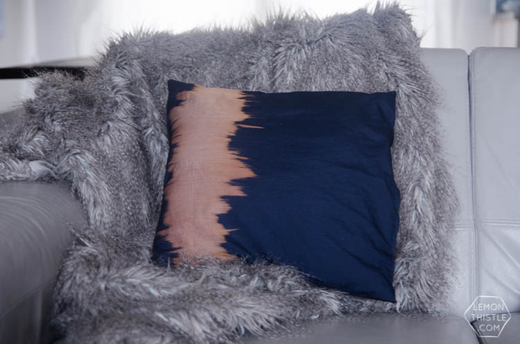 Awesome DIY pillow idea! Painting with bleach on navy fabric- love it!