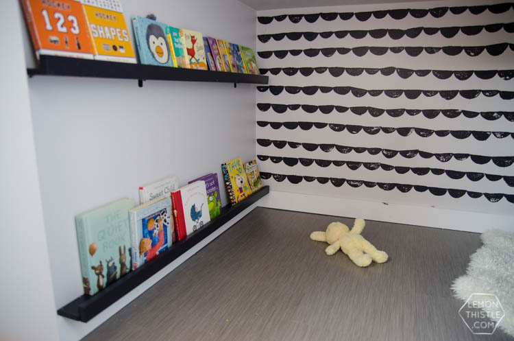 An under stairs nook for kids to play! I love the hand stamped 'wallpaper'. Click through for full tutorial