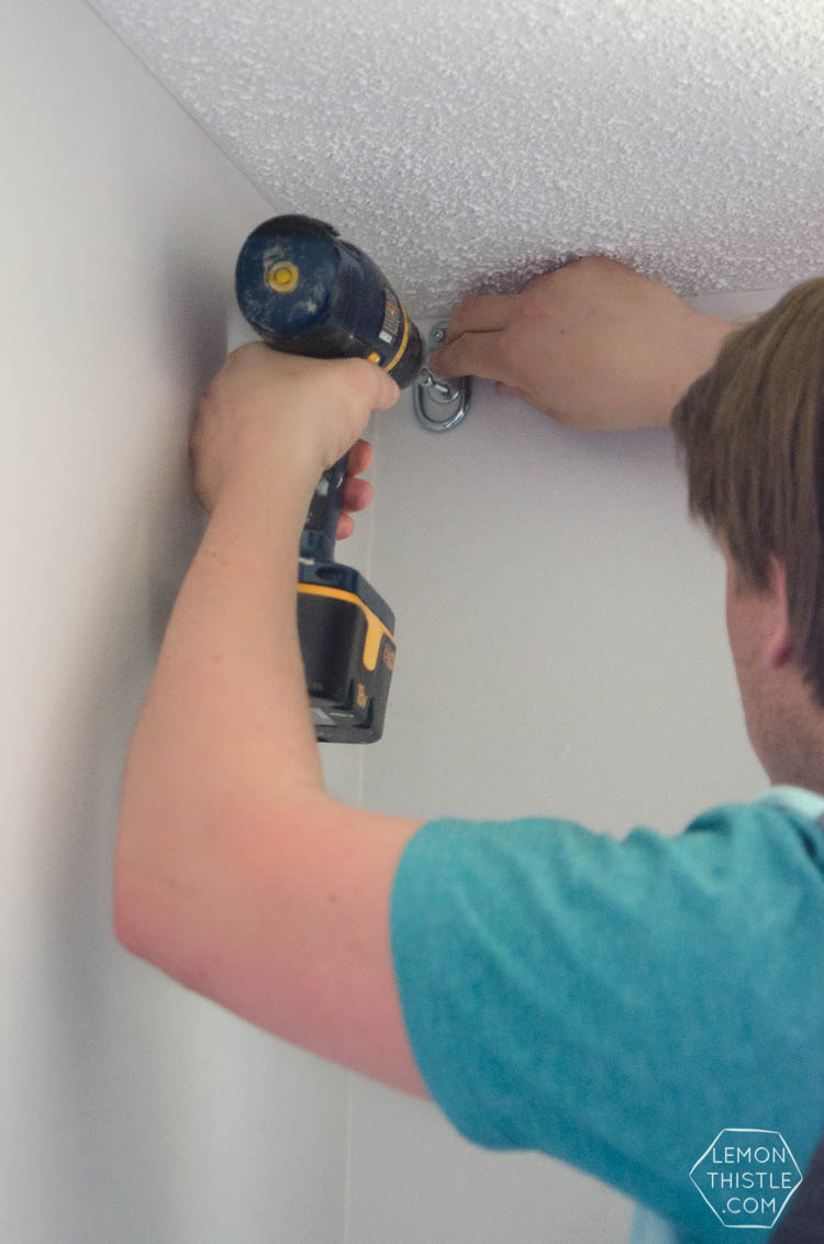 DIY Hanging Rope Shelving- such a fun alternative to a bookshelf!
