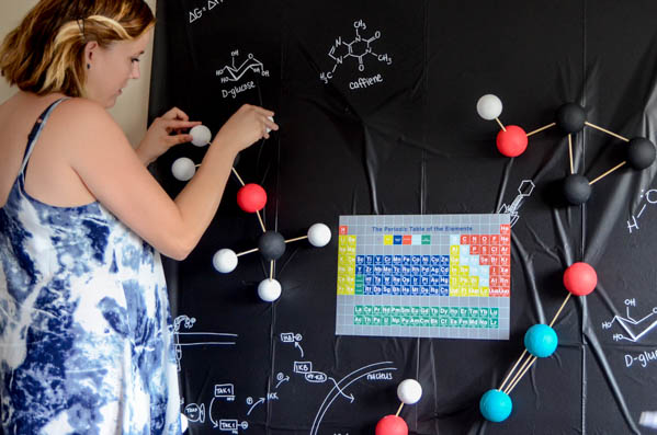 DIY a fun science themed grad party- this is SO much fun! I love that backdrop