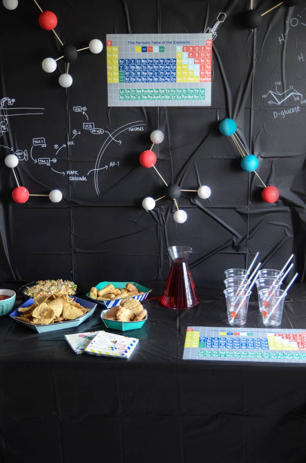 DIY a fun science themed grad party- this is SO much fun! I love that backdrop