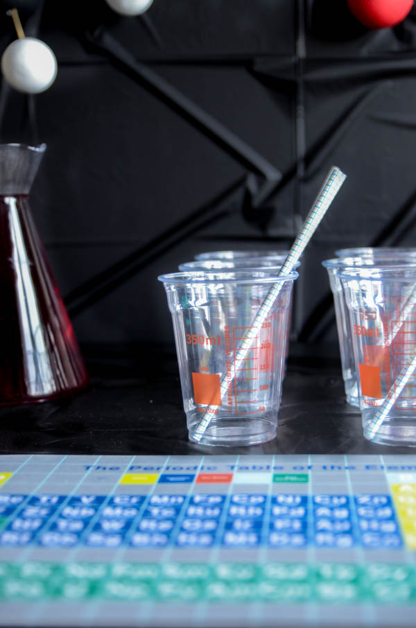 DIY a fun science themed grad party- this is SO much fun! I love that backdrop
