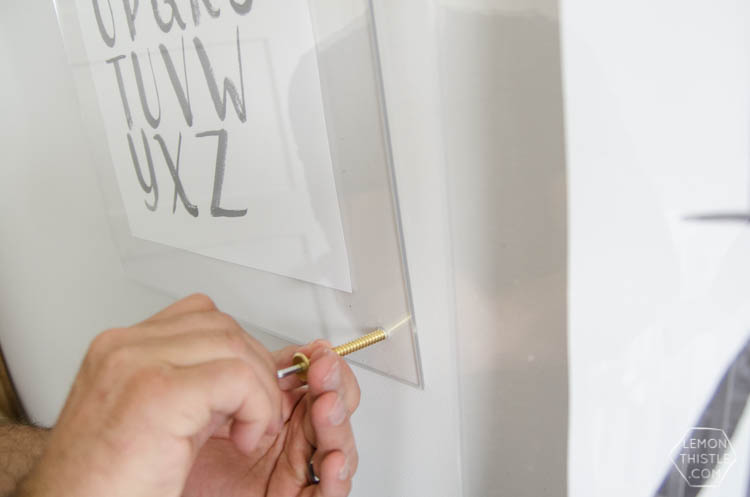 DIY brass and acrylic floating frames- for a fraction of the cost! So modern, I love it!