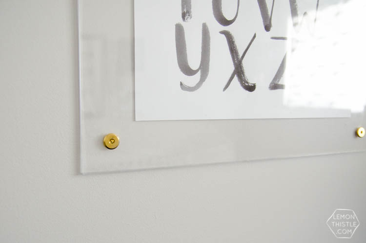 DIY brass and acrylic floating frames- for a fraction of the cost! So modern, I love it!