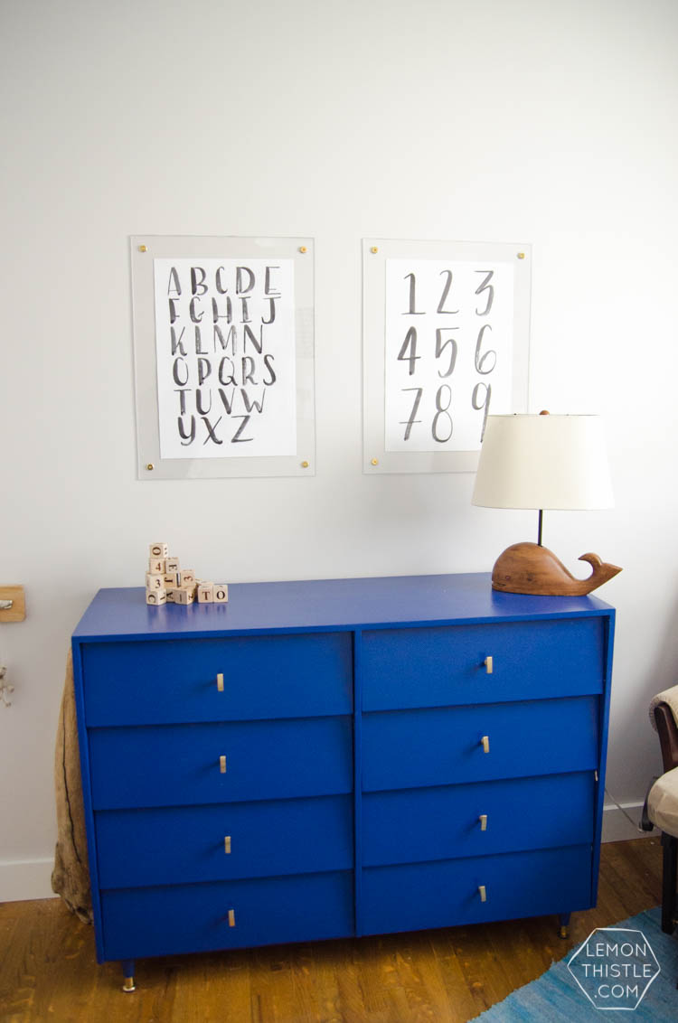 DIY brass and acrylic floating frames- for a fraction of the cost! So modern, I love it!