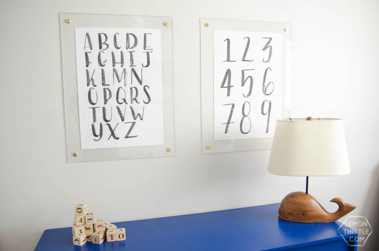DIY brass and acrylic floating frames- for a fraction of the cost! So modern, I love it!