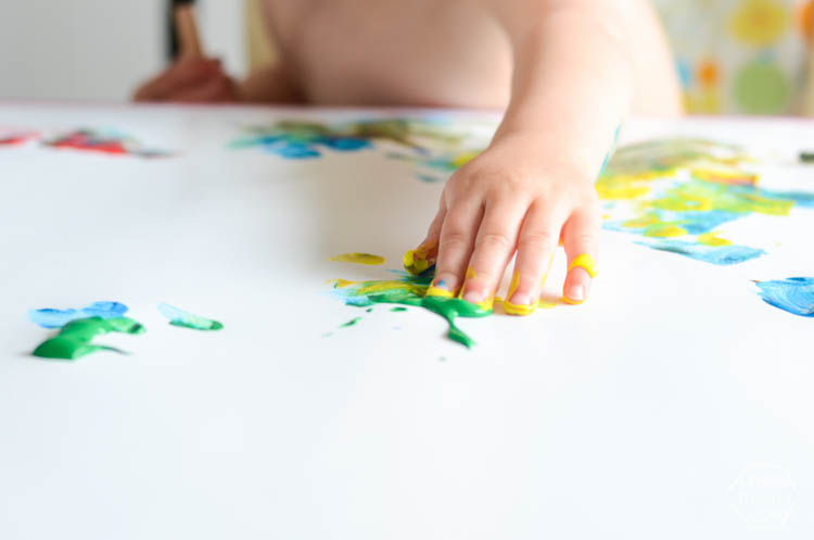 DIY Kids Geometric Art from Finger Painting- this is such a fun way to involve kids artwork in home decor!