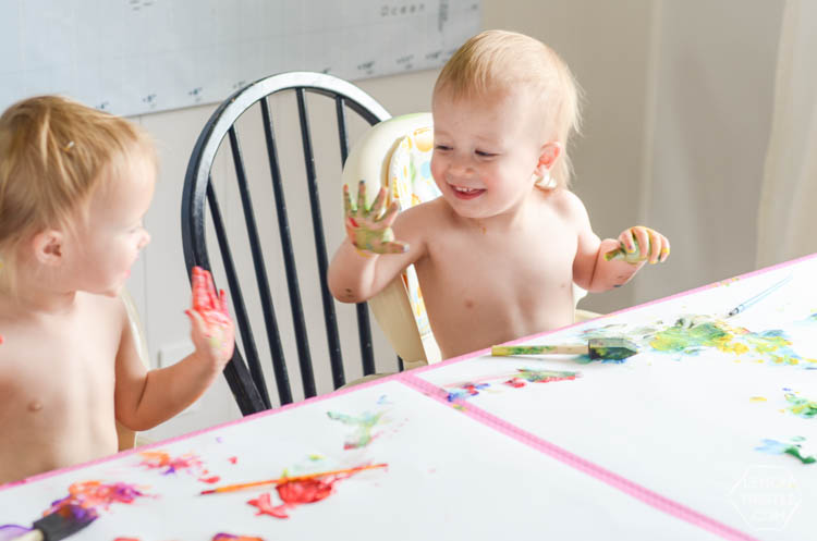 DIY Kids Geometric Art from Finger Painting- this is such a fun way to involve kids artwork in home decor!