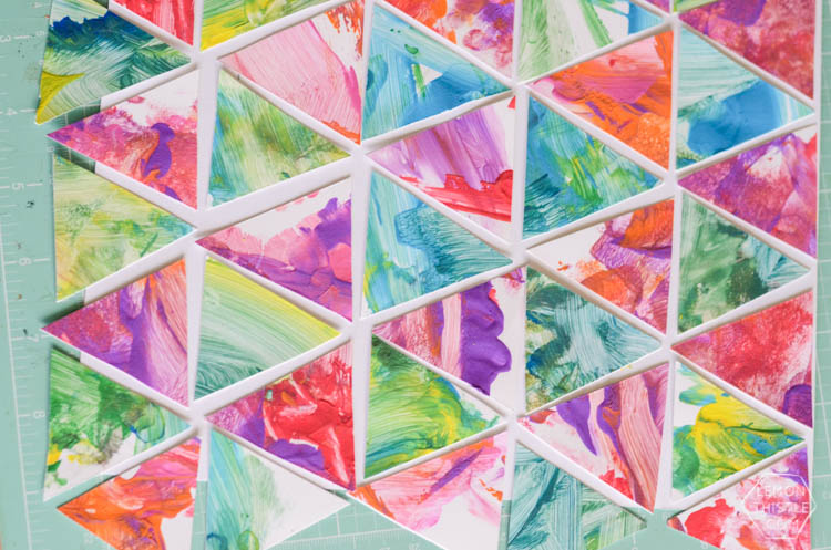 DIY Kids Geometric Art from Finger Painting- this is such a fun way to involve kids artwork in home decor!