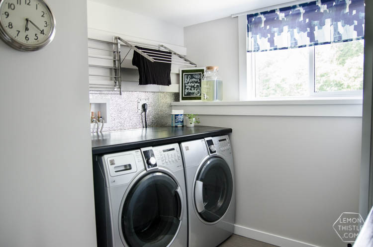 I love this laundry room makeover! I can't believe those countertops are WOOD!
